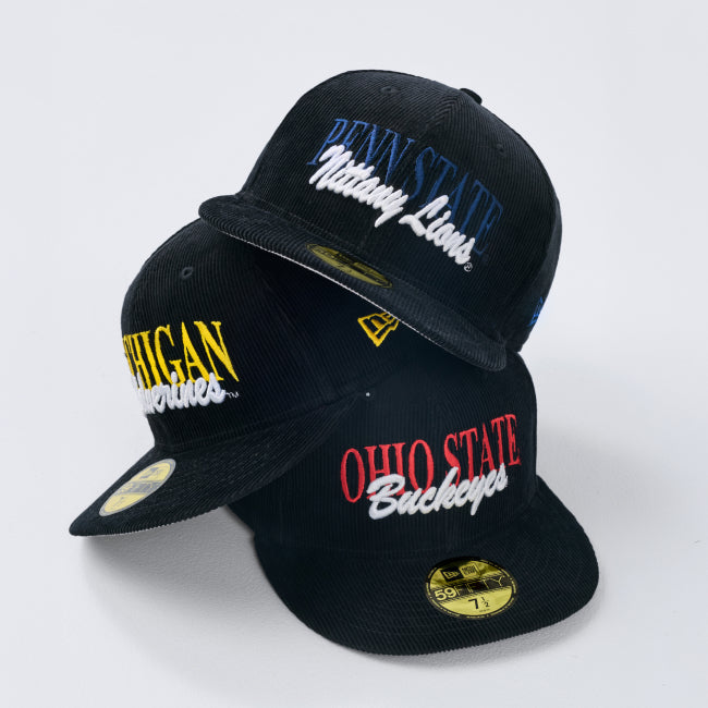 Shop Just Caps College Varsity Script headwear