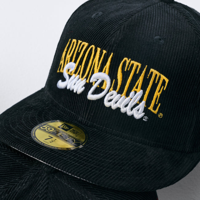 Shop Just Caps College Varsity Script headwear