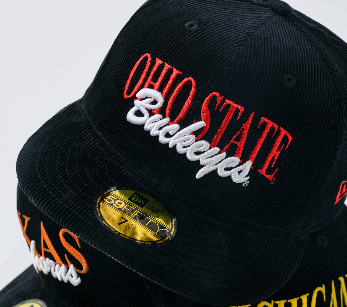 Shop Just Caps College Varsity Script headwear