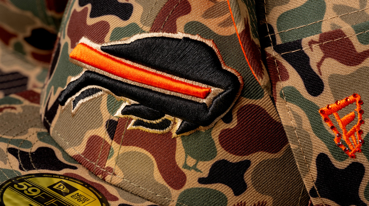 Shop designs by Dion Dawkins at New Era Cap.