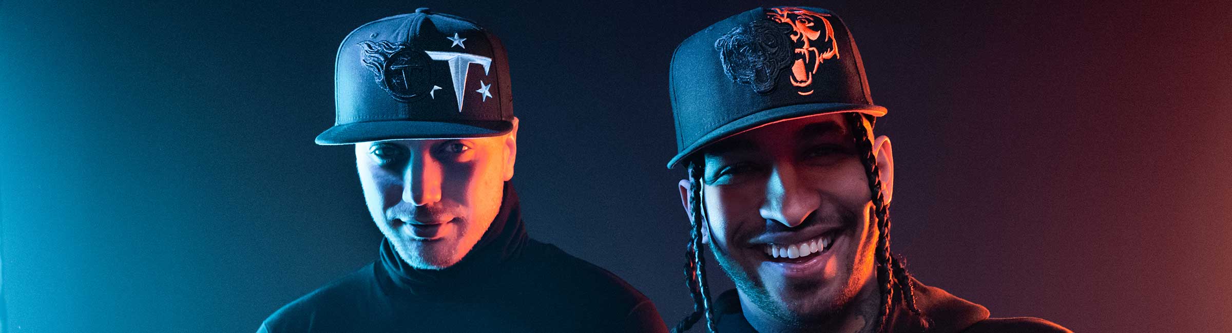 NFL Logo Feature - 2 men wearing Tennessee Titans and Cincinnati Bengals hat