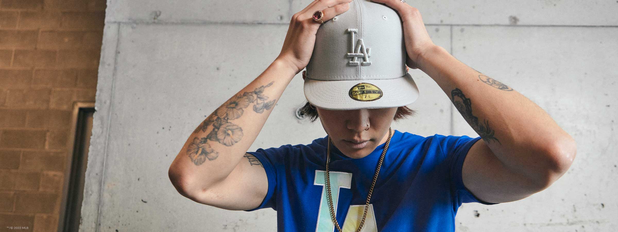 Man wearing Los Angeles Dodgers hat and Ice Dye shirt