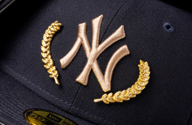 <p>Gold accents draw attention to your favorite team in hoodies, t-shirts, and 59FIFTYs.</p>