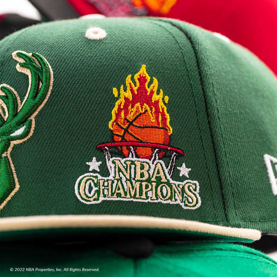 Green Milwaukee Bucks hat with NBA fire champion side patch