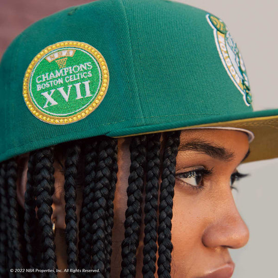 Sidepatch of Boston Celtics Max Bet 59FIFTY Fitted on model