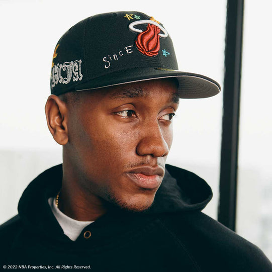 Model wearing NBA Scribble Miami Heat hat