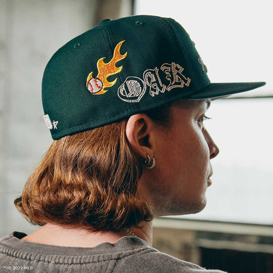 Side and back of MLB Scribble Oakland Athletics hat