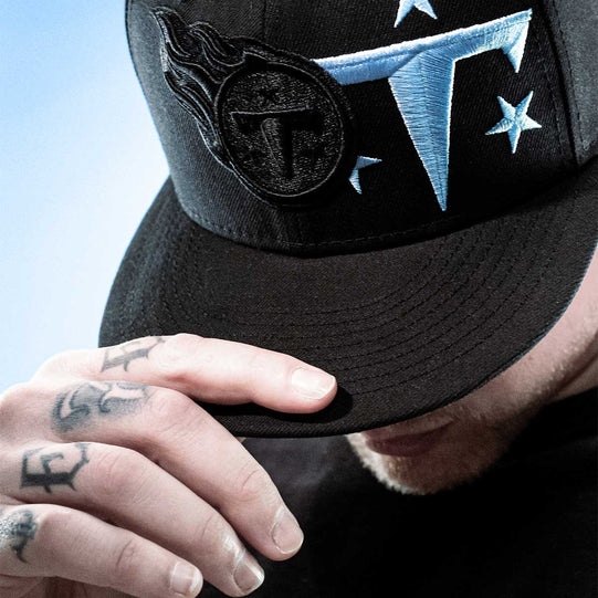Man wearing Tennessee Titans hat
